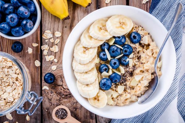 Oats blueberries and banana in a bowl